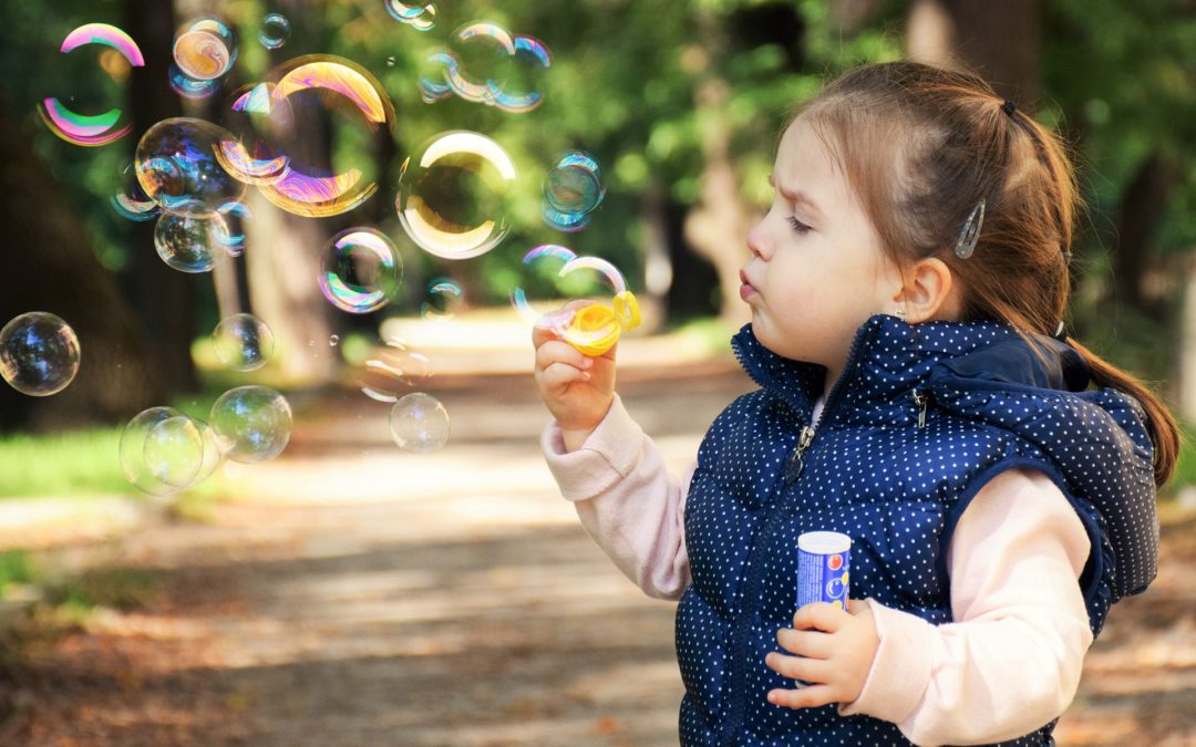 Girl blowing bubbles